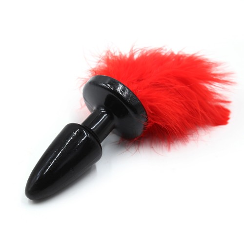butt plug met rode veren